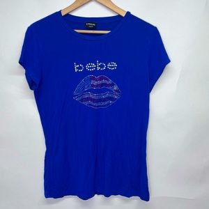 Bebe women’s blue blouse 4th of July lips size Large